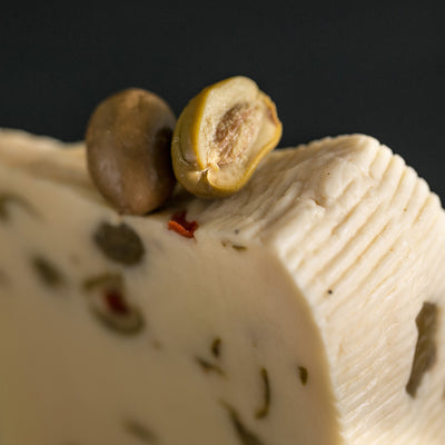 Pecoricco Cheese with Chilli Pepper Olives and Arugula