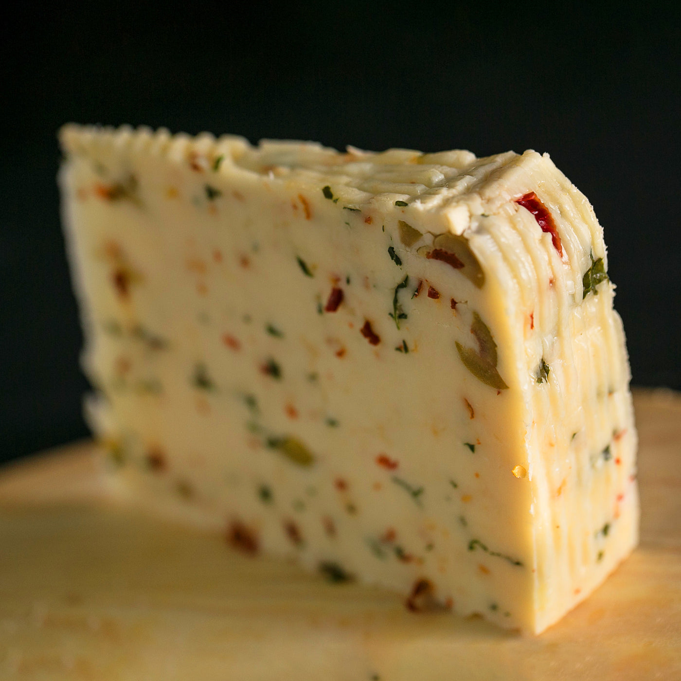 Pecoricco Cheese with Chilli Pepper Olives and Arugula