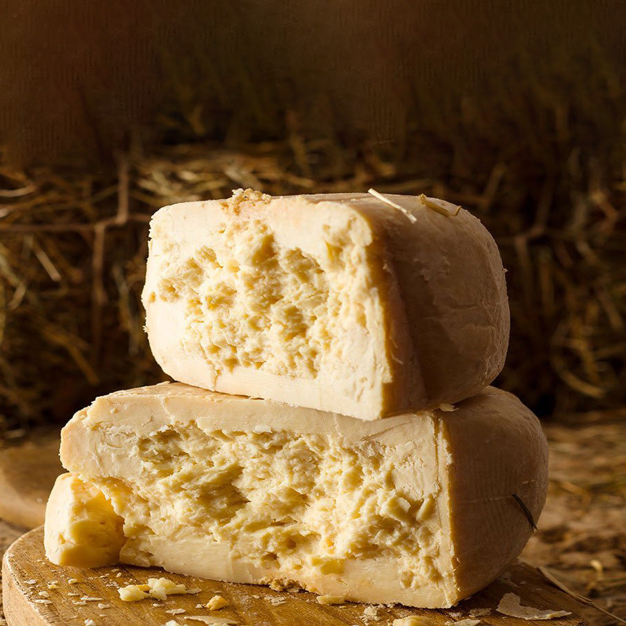 Aging Tuscan Pecorino Cheese in a cave